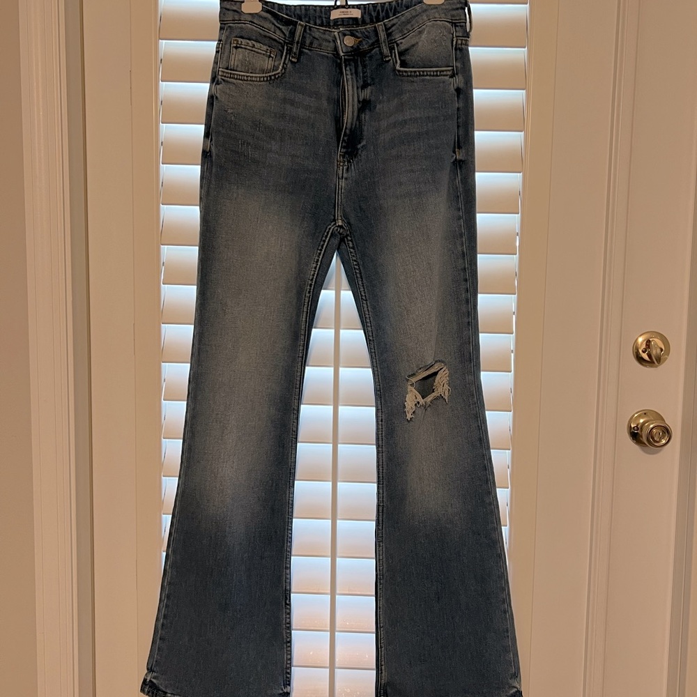 Forever 21 flare jeans!! Distress, long, stretchy, new never used.
